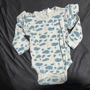Kate Quinn ruffle sleeve onesie